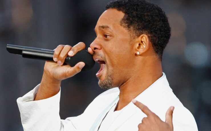 Will Smith cantando durante evento em homenagem ao Nelson Mandela