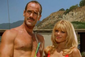 Michael Newman e Pamela Anderson em 'Baywatch'