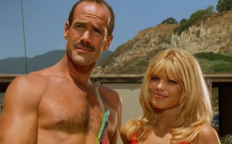 Michael Newman e Pamela Anderson em 'Baywatch'