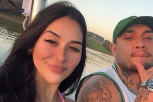 O cantor MC Bin e sua namorada