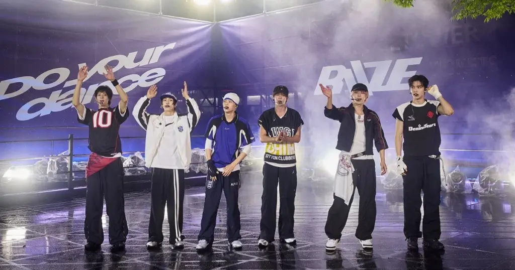 RIIZE faz show na Namsan Tower e enfrenta chuva com energia 1 RIIZE (Reprodução/SM ENTERTAINMENT)