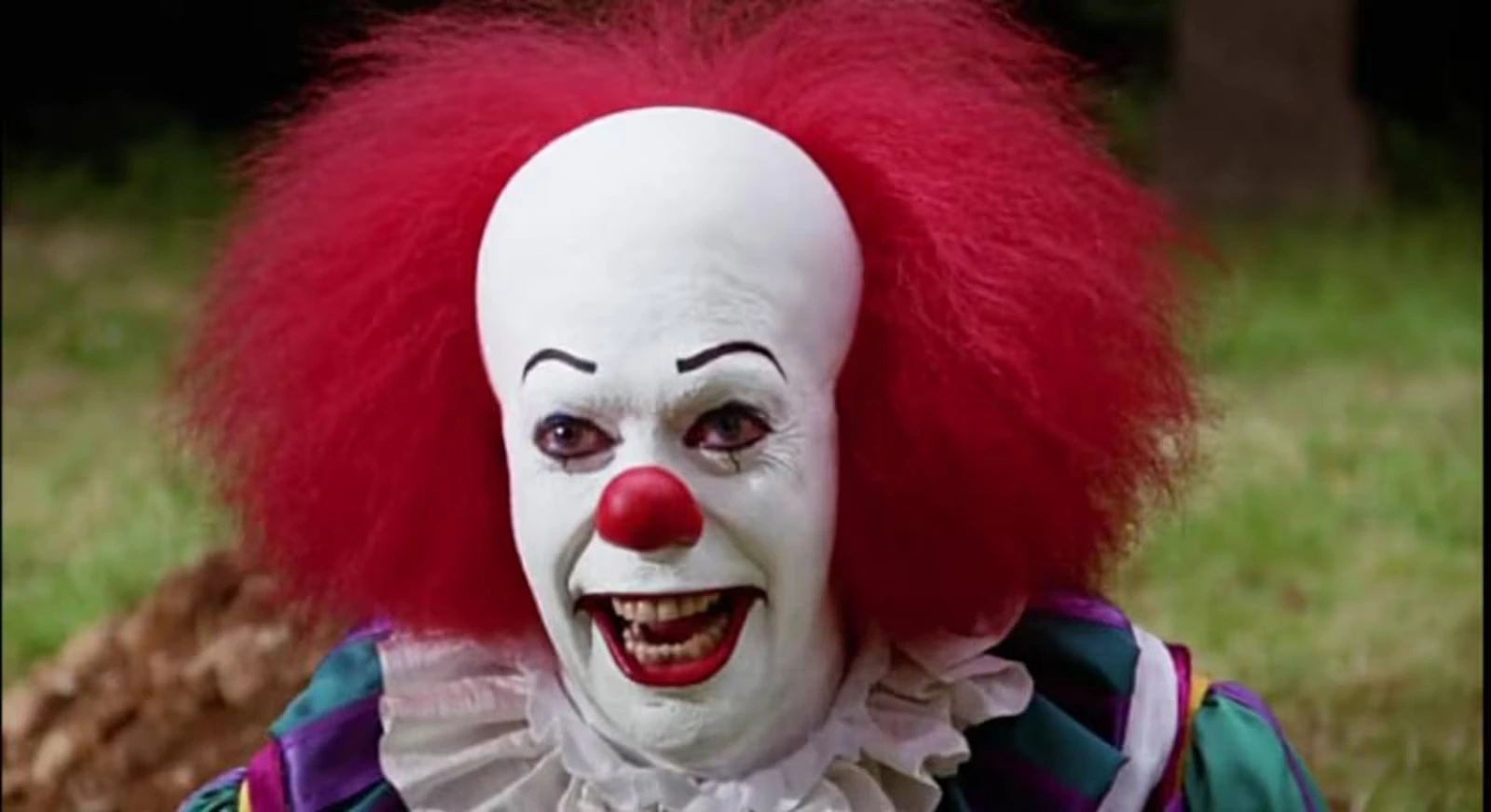 Tim Curry como Pennywise (Reprodução)